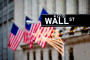 Wall Street sign with US flags
