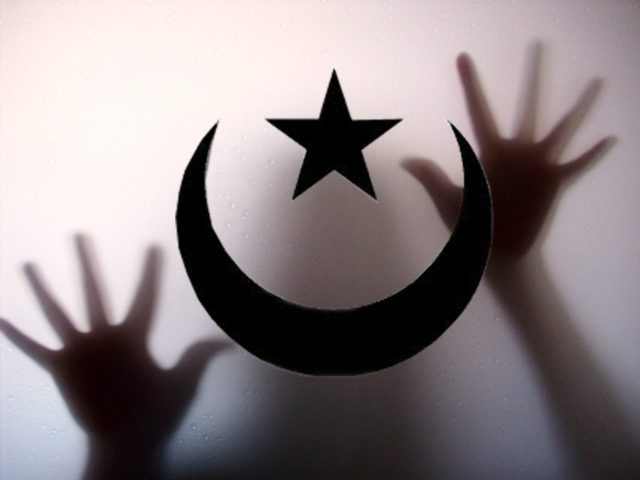 muslim sickle & star on glass w silhouettes