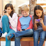 teens on phones - girlscouts.org