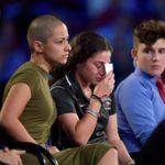 Marjory Stoneman Douglas High School student Emma Gonzalez comforts a classmate during a CNN town hall meeting, at the BB&T Center, in Sunrise