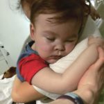 alfie evans in his mother's arms