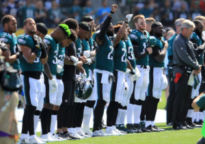Philadelphia Eagles stand for National Anthem