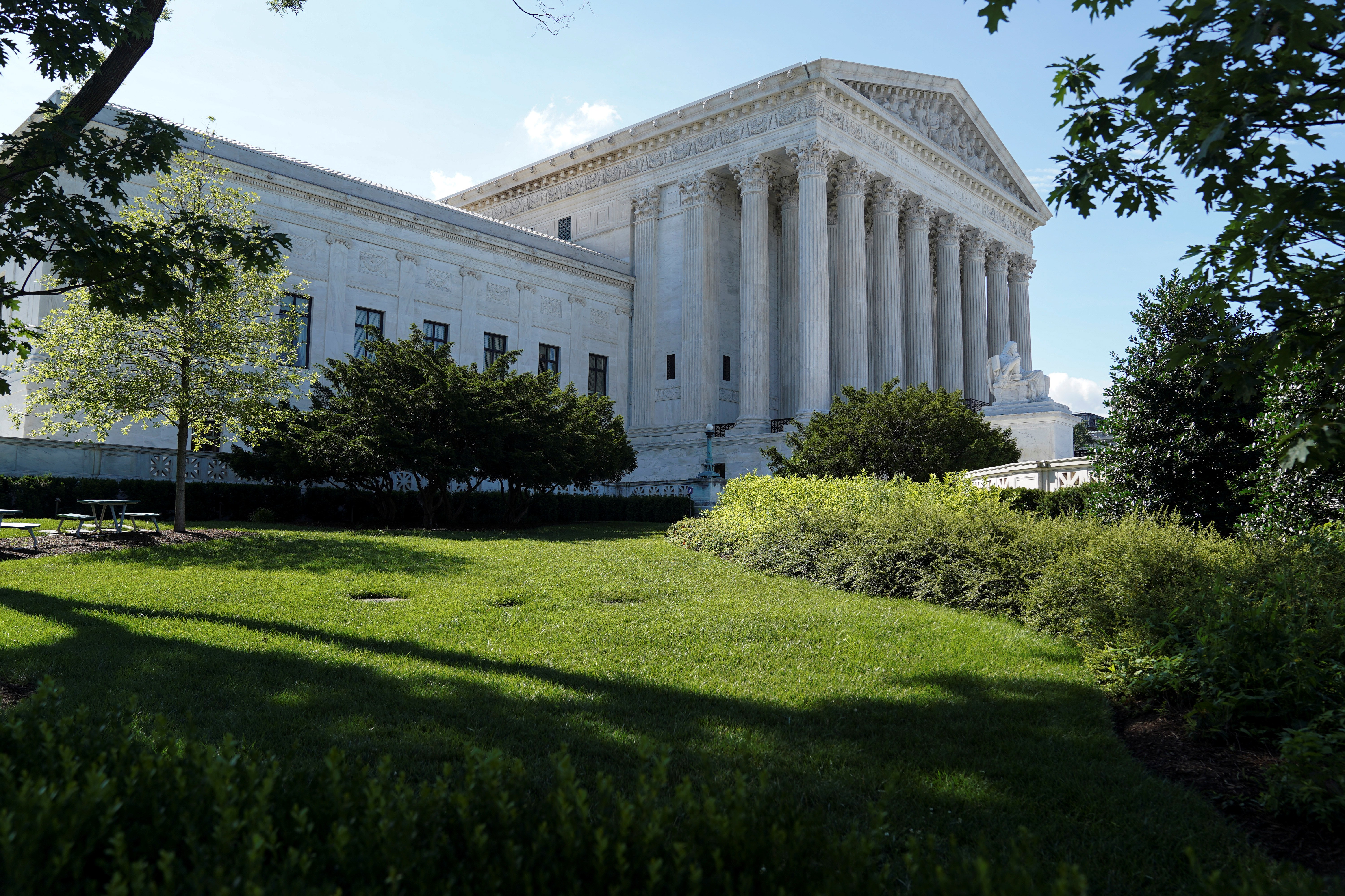 Trees cast shadows outside the U.S. Supreme Court