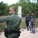 illegal immigrant family w/ border control