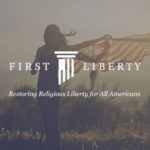First Liberty logo w woman in a field