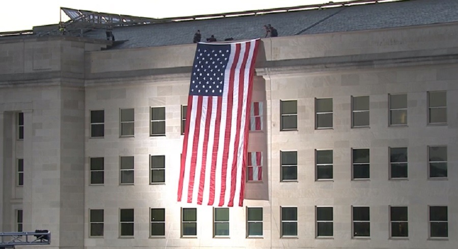911 flag hanging from the pentagon