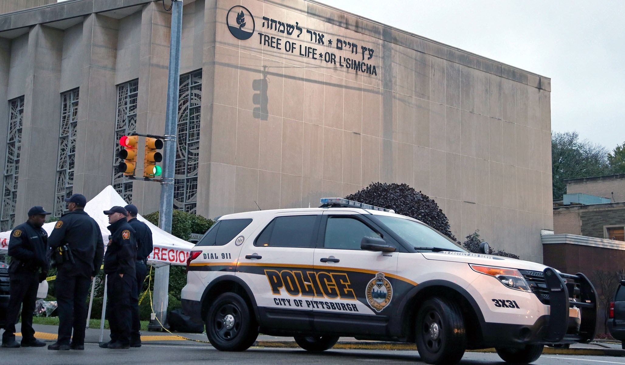 Police officers guard the Tree of Life synagogue