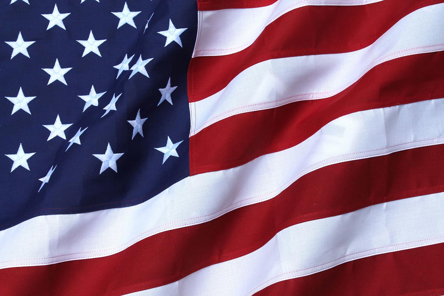 waving American flag closeup-angle