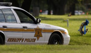 A sheriff patrols Burr Oak Cemetery in Alsip