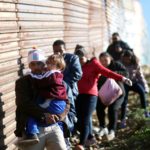 migrants-honduras-border-wall