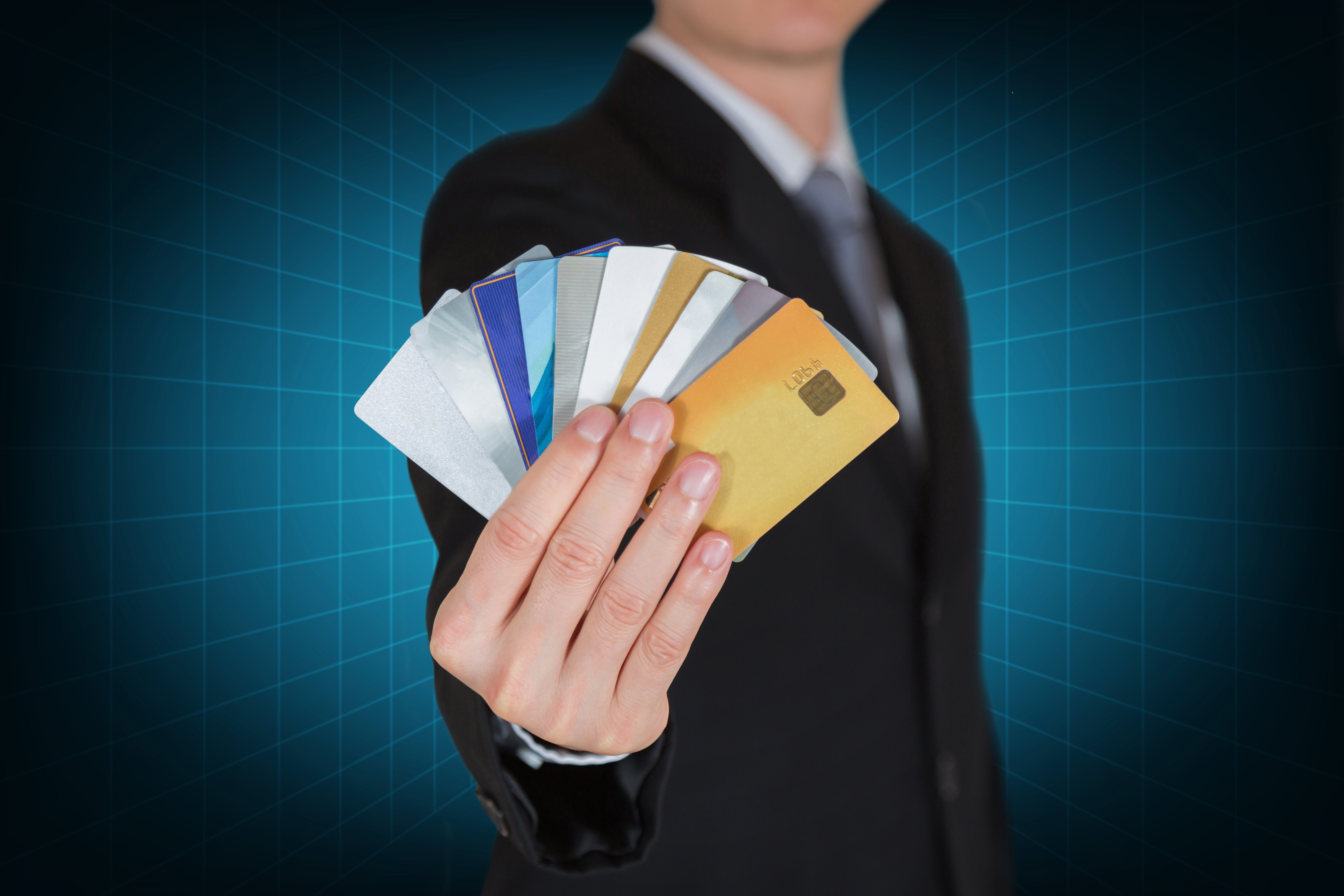 Businessman with many credit cards