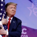 trump hugs US flag at cpac 19