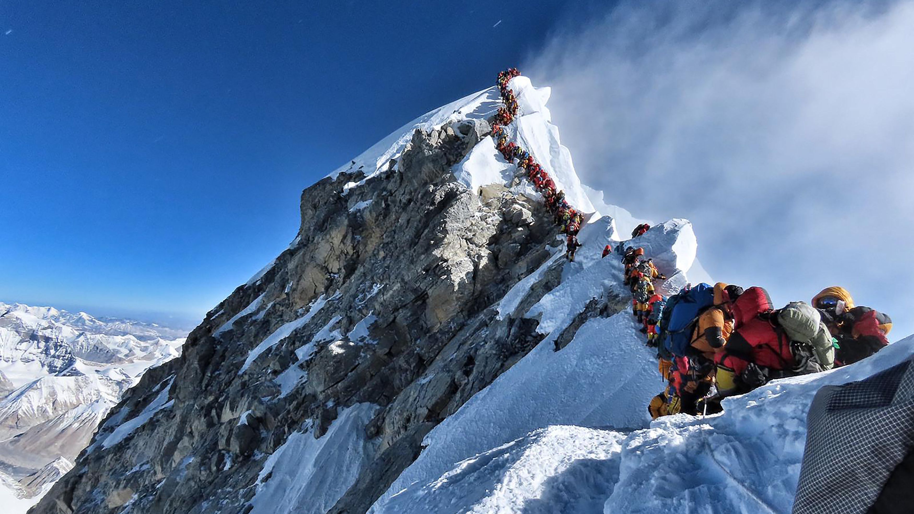 Climbers waiting to stand atop Everest