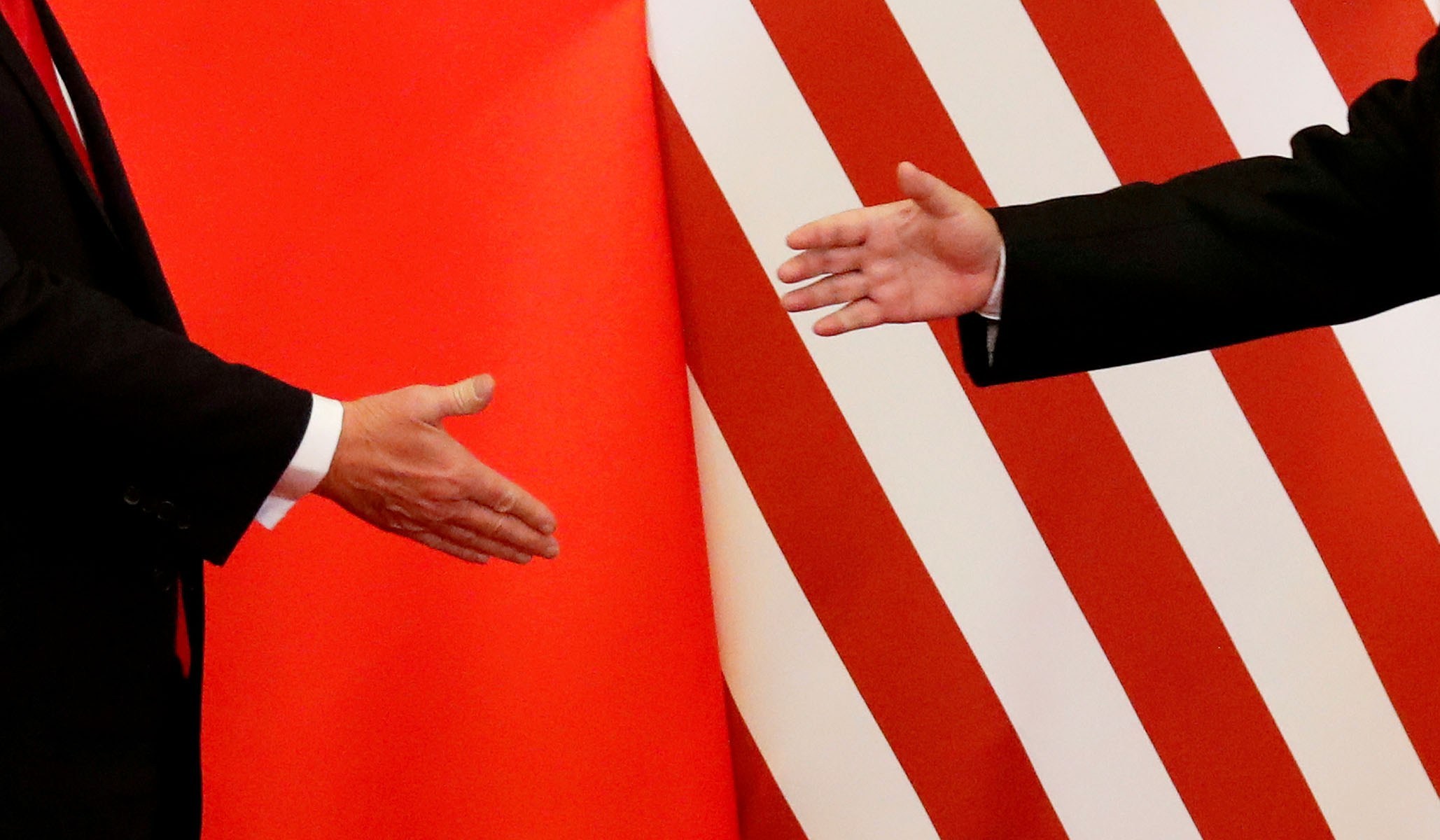 Donald Trump & China's President Xi Jinping shake hands