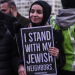 Muslim woman stands w/ Jews