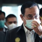 Chinese officials w flu masks
