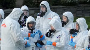 haz-mat workers receive supplies