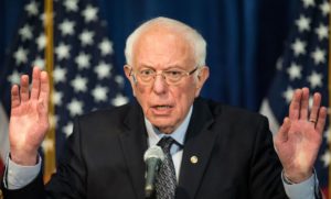 Bernie - hands raised