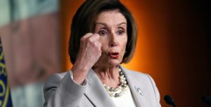 Pelosi - fist raised