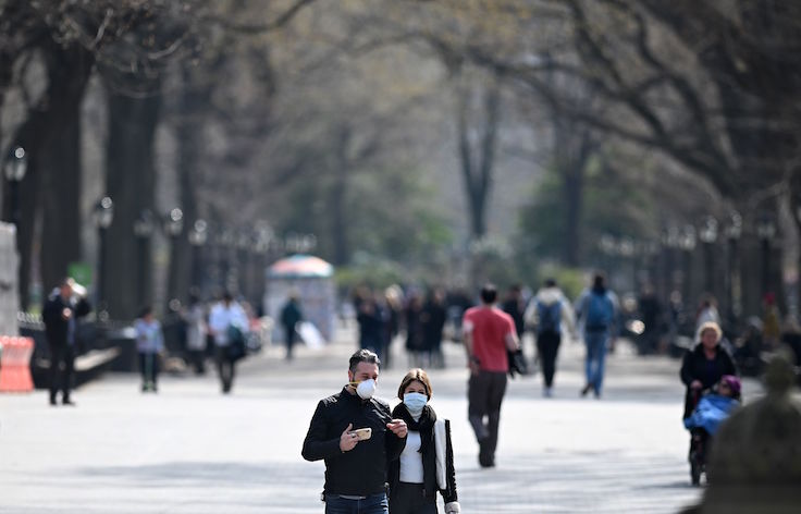 couple wearing masks in Central Park