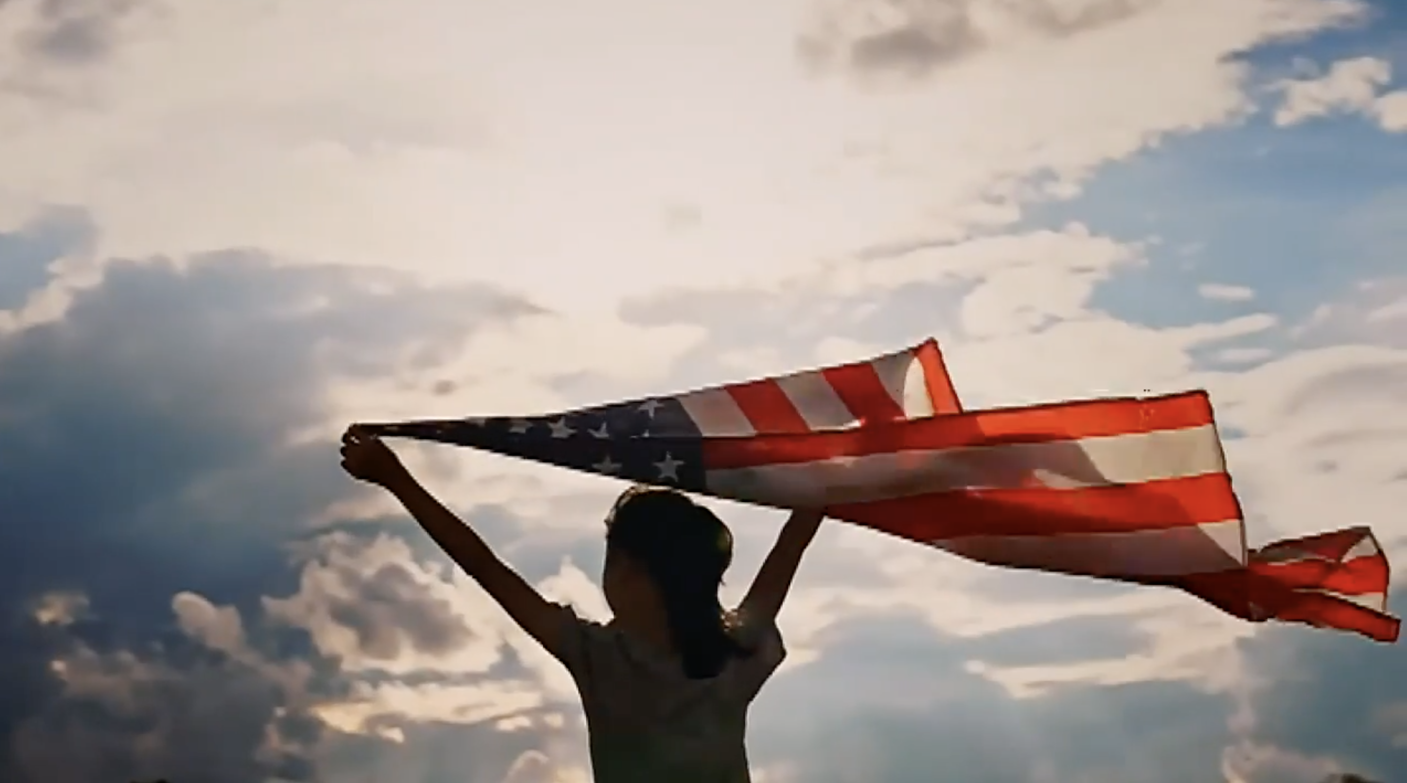 Child with American Flag over head