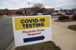 Coronavirus Testing sign w arrow