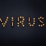 pills-on-blue-background spelling VIRUS