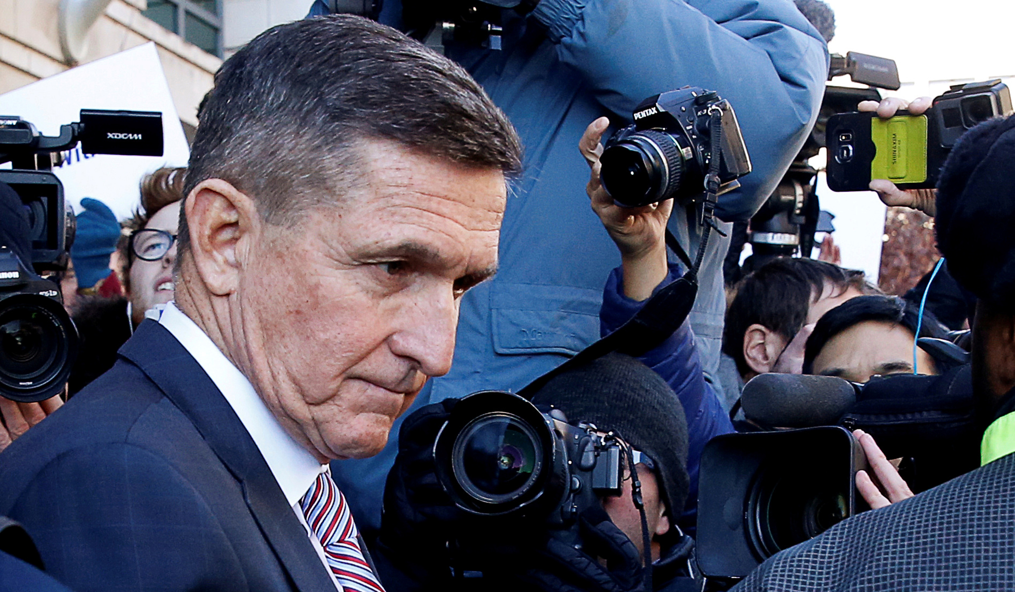 Former U.S. national security adviser Flynn leaves court house