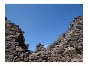 Broken gray stone wall