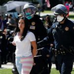 Woman arrested for protesting lockdown