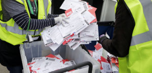 Postal workers bins of mail in ballots 2