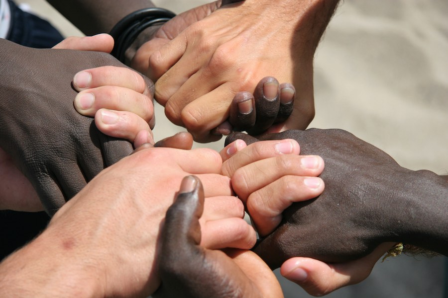 blacks-and-whites-holding hands
