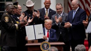 Trump signs exec order to reform police