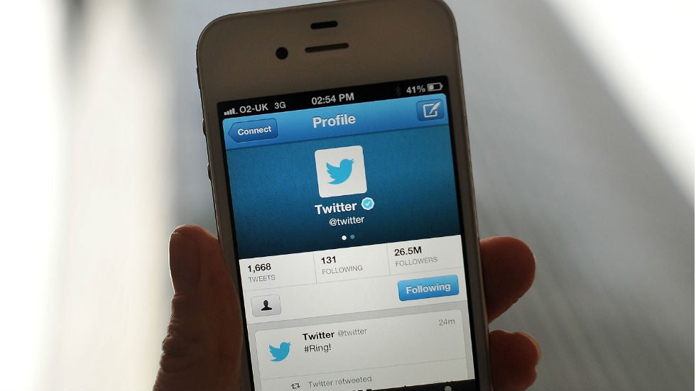 Phone showing twitter logo