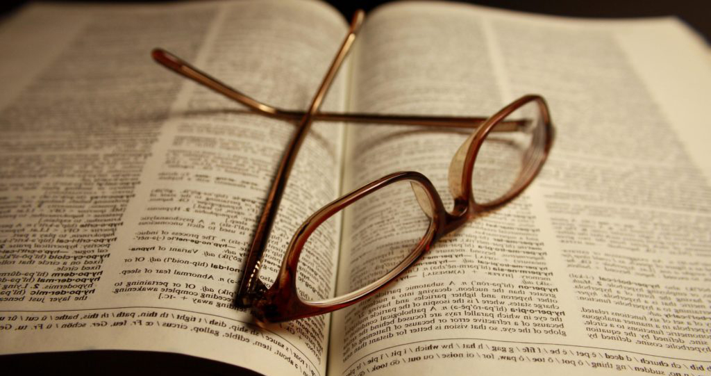 dictionary with glasses