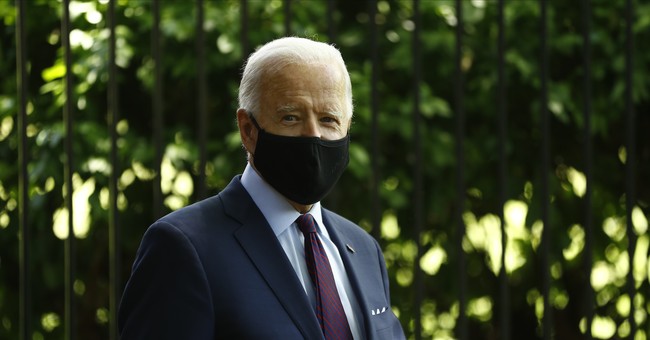 Joe Biden wearing black mask