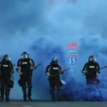 First Responders in cloud of tear gas near I-35