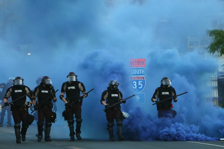First Responders in cloud of tear gas near I-35