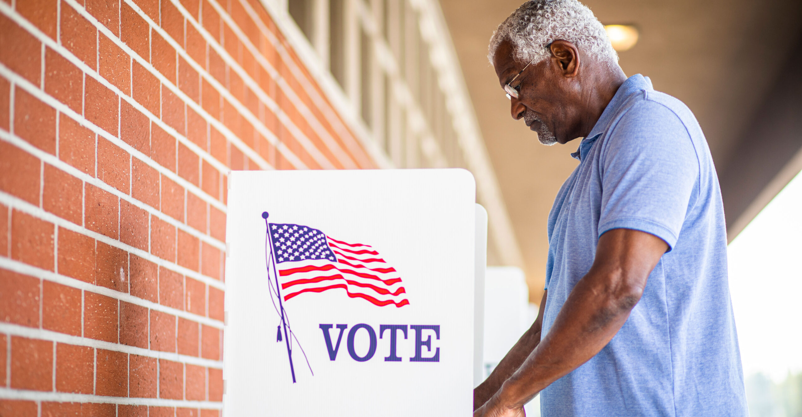 Elderly Black Man Voting