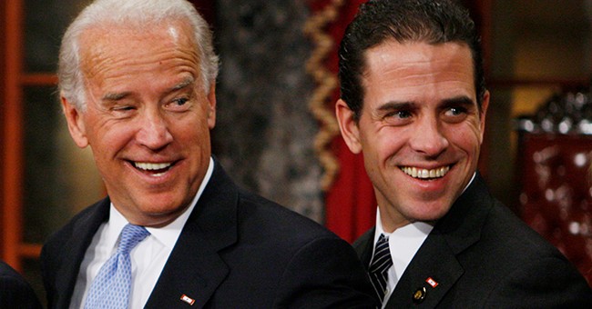 Joe & Hunter Biden over their shoulder smiles