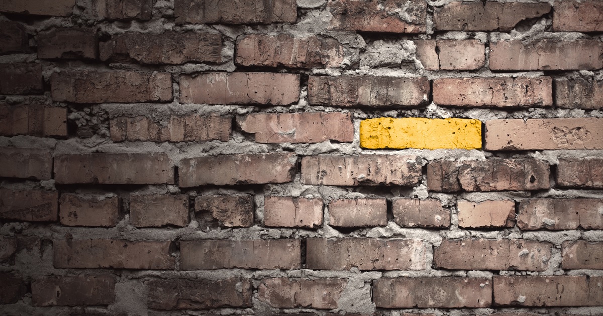 brick wall - one yellow brick