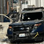 burned beat-up police car in Seattle