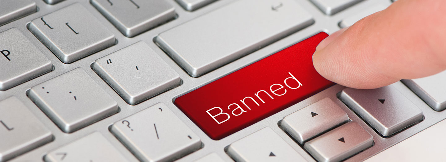 Banned button on a keyboard-censorship