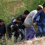 Children crossing the border