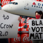 Coke & Delta Woke - protesters