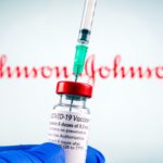 JJvaccine - gloved hand - needle