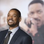 Will Smith in front of movie screen