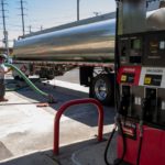 Tanker Truck Delivers Gas to Station