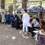 Afghani's flee to park