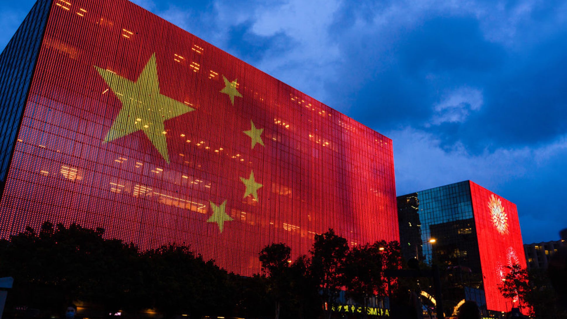 Building lit w Chinese flag